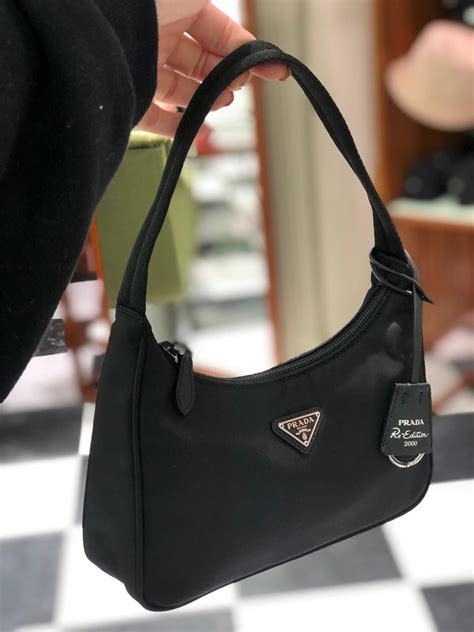 prada small black nylon bag|prada bag with small pouch.